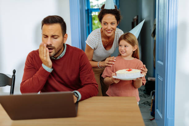 istock Family surprising tired father for his birthday 1701002392