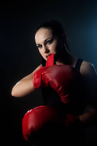 istock One young woman boxing _ vertical 170100342