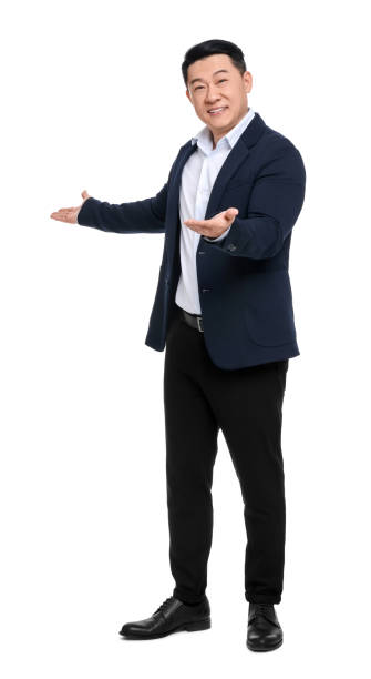 istock Businessman in suit posing on white background 1701005523