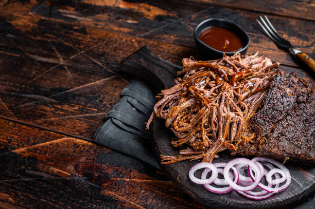 istock Traditional barbecue wagyu pulled beef on wooden board. Wooden background. Top view. Copy space 1701012558