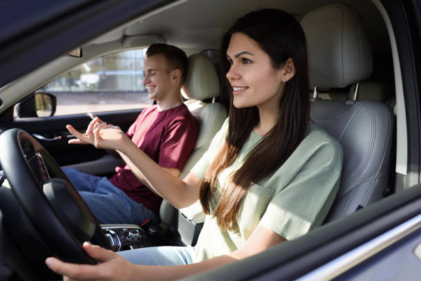 istock Happy young couple travelling together by car 1701014739