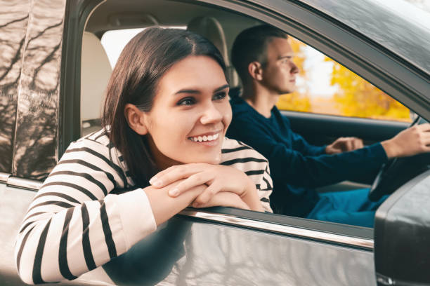 istock Happy young couple travelling together by car 1701014743