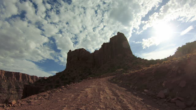 POV car off road driving on Shafer trail in canyon, Moab