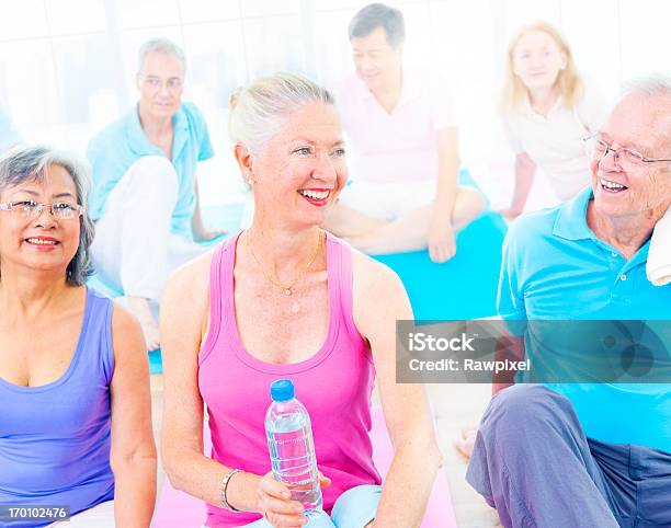 Happy Yoga Class Stock Photo - Download Image Now - 50-59 Years, 60-69 Years, Active Lifestyle