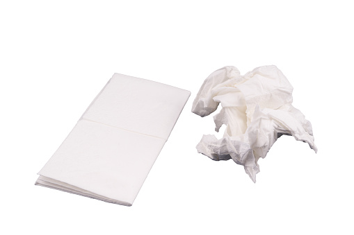 new and one used paper handkerchiefs on a transparent background