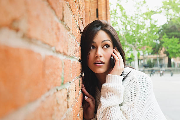 istock Young woman with phone 170102610