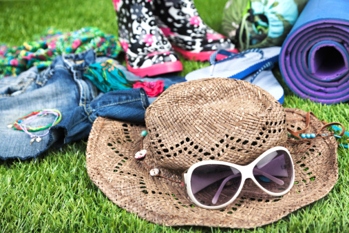 Flipflops, wellies, bed roll, sunglasses etc for camping at a music festival