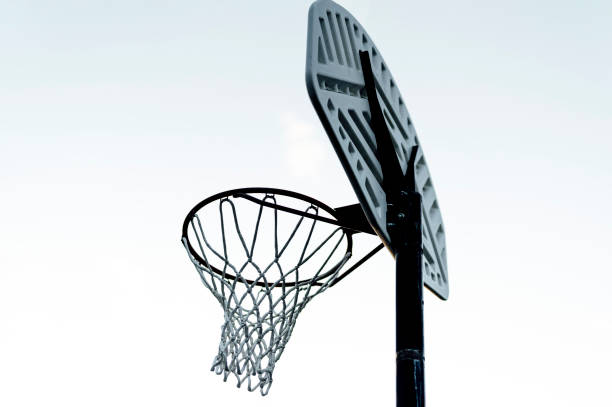istock Basketball Hoop With Blue Sky In Background, Dusk 1701043048
