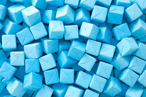 papel azul em forma de cubo - craft block togetherness community - fotografias e filmes do acervo