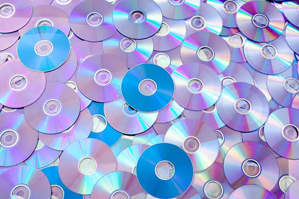 High angle view of lots of DVD disks