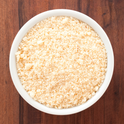 Top view of white bowl full of almond flour