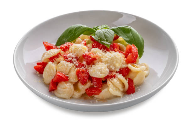 istock Pasta orecchiette seasoned with fresh tomato 1701059086