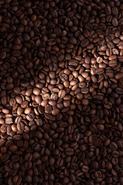 istock Texture of roasted coffee beans 1701062780