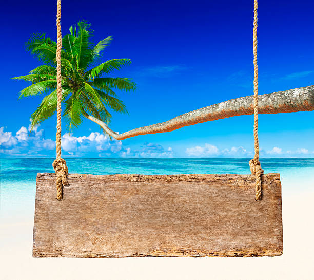 istock Wood sign on the beach. 170107360