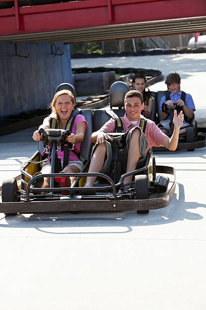 istock Teenagers riding go-carts 170107503