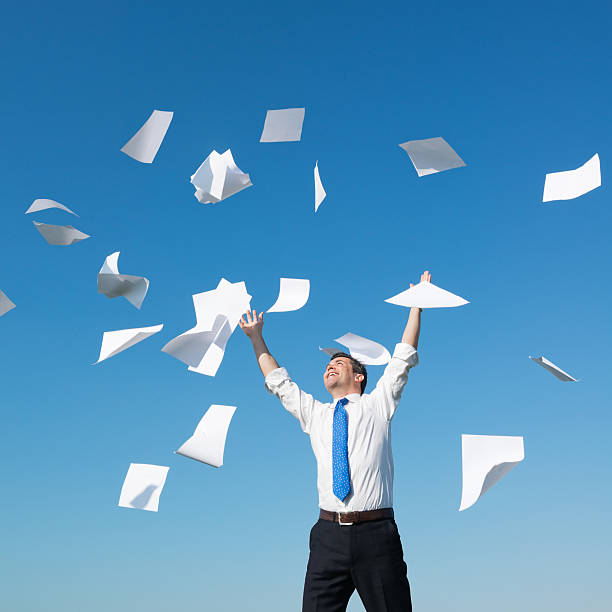 istock Businessman Throwing Papers in The Air 170107578