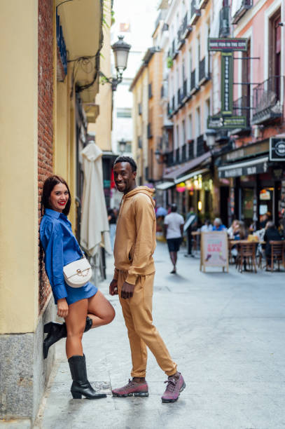 istock Multiethnic Couple Looking At Each Other On A Street 1701078414
