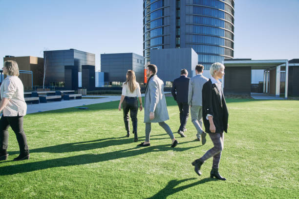 istock businessmen each walking to a different place 1701078965