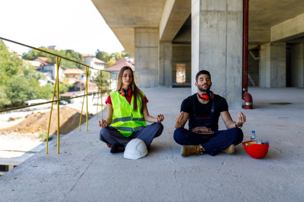 istock A Young Couple of Workers are Resting During a Work at Building Site. 1701082685