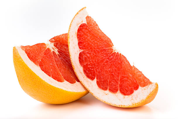 グレープフルーツのスライス - citrus fruit portion grapefruit fruit ストックフォトと画像