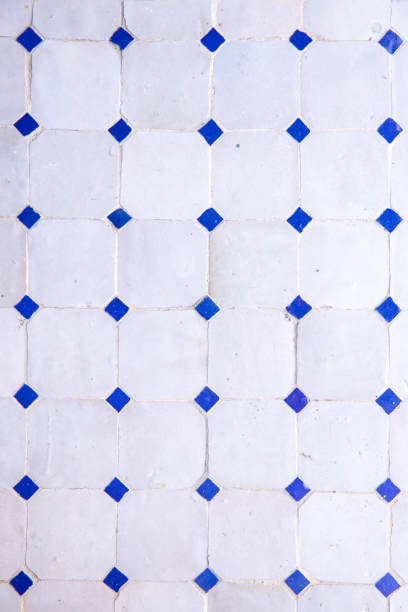 istock Marrakech white blue glazed tiles mosaic octagon dot pattern on floor of Moroccan Riad 1701127162