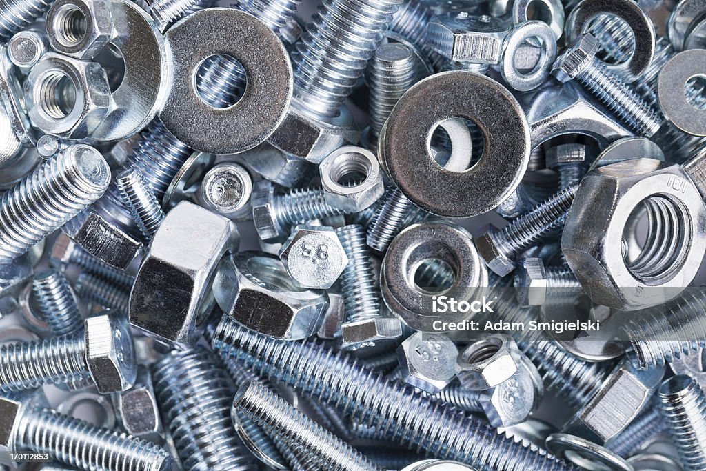 nuts and bolts pile of steel nuts and bolts Screw Stock Photo