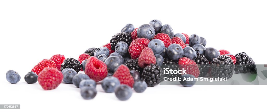 berries fresh forest fruits:  blueberries, rasberries and blackberries on white background Raspberry Stock Photo