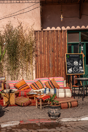 Marrakech Bazaar Coffee Shop with Moroccan Chairs and seat cushions at Medina Souk market
