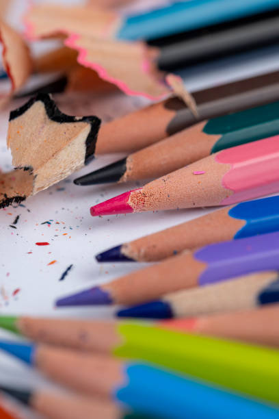 istock sharp pencil of different colors on paper close-up 1701148222