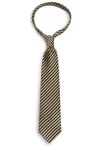 Gold and black necktie isolated on white.