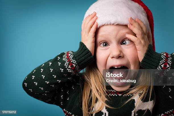 Foto de Santas Salientado Pouco De Papai Noel Vestindo Chapéu E Suéter Natalino e mais fotos de stock de Natal