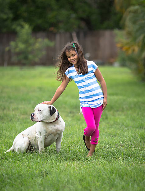 istock little girl and dog 170115748