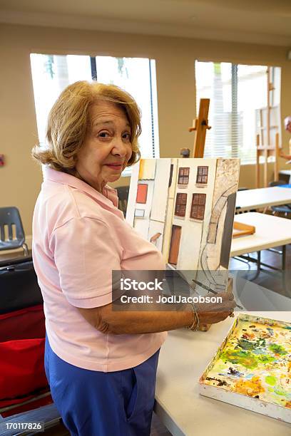 Senior Woman Studying Art Class Conducted By Locals Stock Photo - Download Image Now