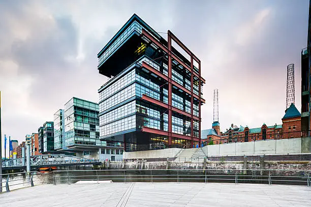 Modern architecture in the famous Hafencity of Hamburg, Germany. This part of the Hafencity is called "Traditionsschiffhafen"/ "Sandtorhafen". Image taken with Eos 1Ds Mark II and Canon Tilt/ Shift E 17mm f 4.0. XXL size image.