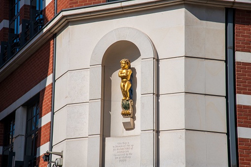 London, United Kingdom - September 16, 2023: Golden Boy of Pye Corner near Smithfield Market in London