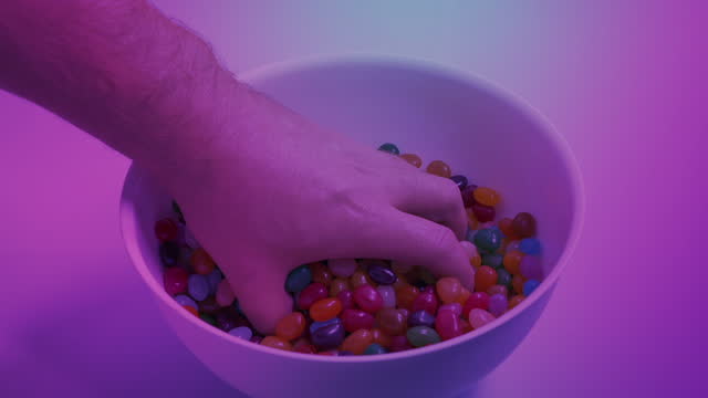 Grabbing Big Handful Of Candy Beans At Party 2 Versions