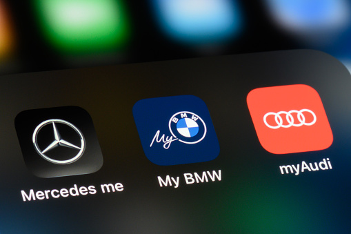 Toronto, Canada - September 24, 2023:  Connected apps of major German car brands on an Apple iPhone: Mercedes-Benz, BMW, Audi.