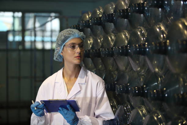 istock Team worker produces drinking water in a clean drinking water plant. drinking water production line 1701211351