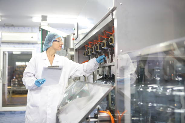 istock Team worker produces drinking water in a clean drinking water plant. drinking water production line 1701212979