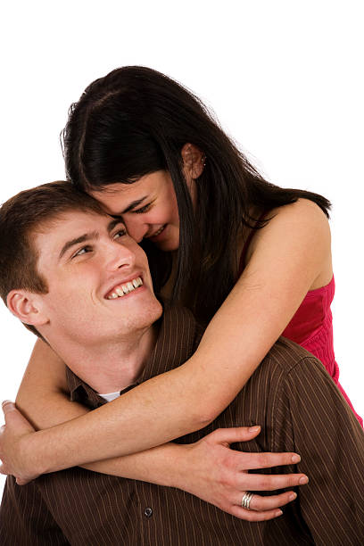 istock Happy young couple in love Hispanic smiling hugging isolated 170123302