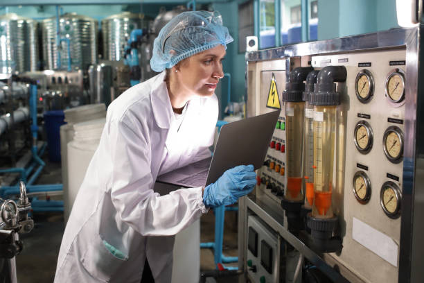 istock Team worker produces drinking water in a clean drinking water plant. drinking water production line 1701233378