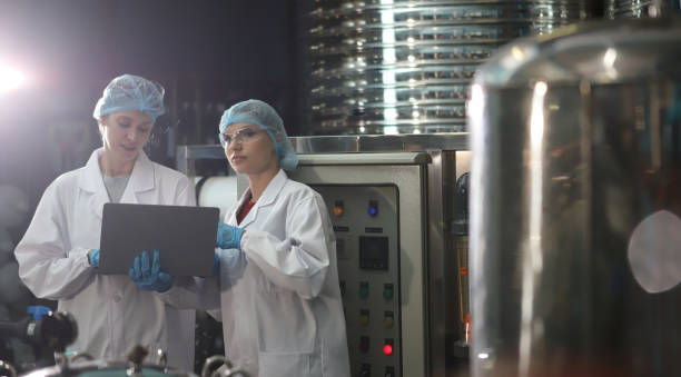 istock Team worker produces drinking water in a clean drinking water plant. drinking water production line 1701241479