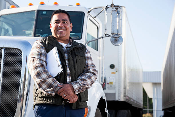 istock Hispanic truck driver with clipboard 170129308