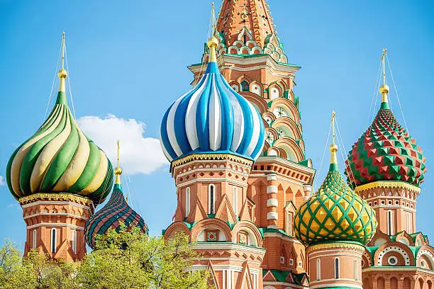 Domes of the famous St. Basil Church in Summer, Russian Orthodox Cathedral, the most famous landmark on the Red Square in Moscow, Russia.