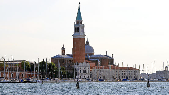 Venice, Italy - July 08, 2011: Island San Giorgio Maggiore With Big Church Tower and Sailboats Marina.