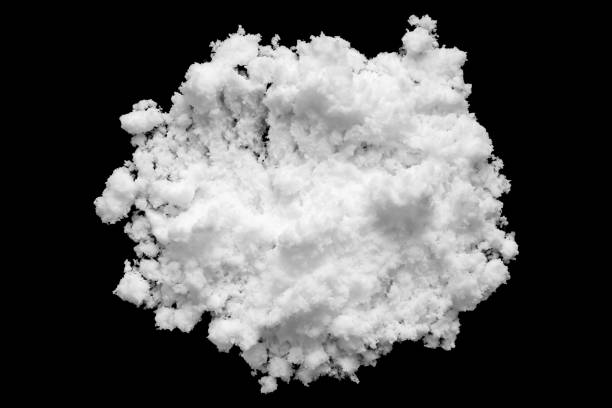 istock White snow isolated on black background close up 1701330960