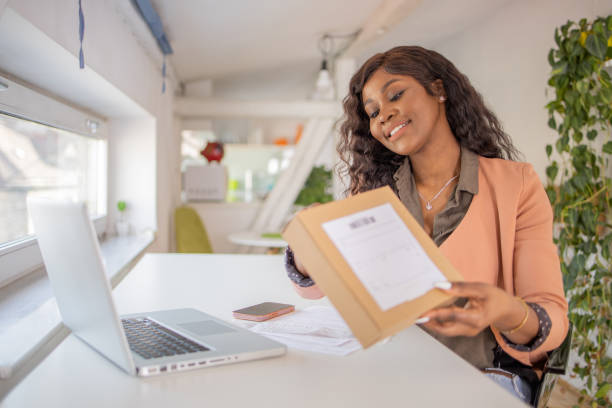 istock Young entrepreneur is sending a package to a customer 1701330981