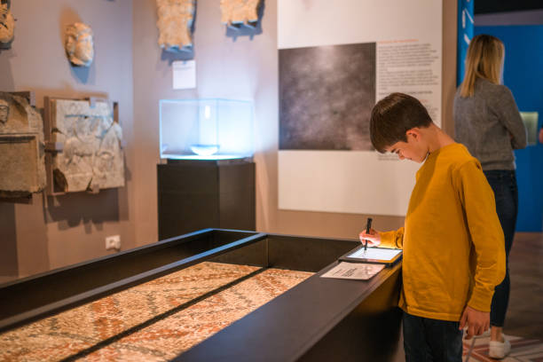 istock Roman Mosaic and Curious Boy 1701351610