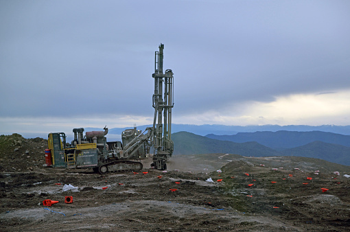 Westport, New Zealand, July 12, 2013: drilling rig prepares blasting holes to remove overburden at stockton coal mine, Westland, New Zealand