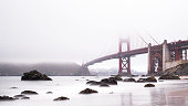 Golden Gate Bridge at dawn with Heavy Fog